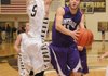 POURING IT ON Fayetteville’s Kile Graves, right, goes for two points as Bentonville’s Nick Smith tries to guards him at Tiger Arena in Bentonville on Friday.
