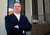 John David Lindsey stands outside Fayetteville’s John Paul Hammerschmidt Federal Building in January.