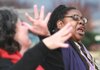 Loretta Ross, founder of the Sister Song Women of Color Reproductive Justice Collective, speaks Saturday at the Rally for Reproductive Justice at the state Capitol in Little Rock as Rhonda Cunningham interprets her remarks for the deaf. 