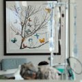 A George Dombeck print hangs in the chemotherapy room at Highlands Oncology Group Tuesday in Rogers....