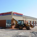 FIRESTONE NEARING COMPLETION Work continues Thursday to finish construction of a new Firestone tire ...