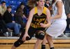 STAFF PHOTO SAMANTHA BAKER -- Prairie Grove's Whitnee Fitts, left, dribbles past Alexis Jones of Shiloh Christian on Tuesday, Jan. 24, 2012 in Springdale. 