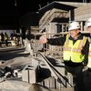 Officials Tour Site