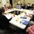 Gan Nunnally, right, contrasts the issues between large and medium population high schools Tuesday d...