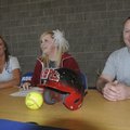 Heather Scott, Rogers High softball player, center, will play her next season at Labette Community C...