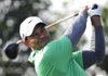 Tiger Woods shot a 2-under-par 70 in Thursday’s first round of the Abu Dhabi Championship and trails tournament leaders Robert Karlsson and Rory McIlroy by three shots. 