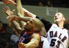 UALR’s Will Neighbour (53) battles for a rebound with South Alabama’s Mychal Ammons (left) during the Trojans’ 75-50 victory over the Jaguars on Thursday at the Jack Stephens Center in Little Rock. 