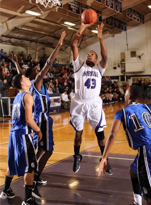 BATTLE OF THE BULLDOGS Malik Fields, a Fayetteville senior, is third on the team in scoring, rebounding and assists in 2011-12 to become one of the Bulldogs’ most versatile post players this season.
