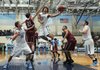 DISTRIBUTING THE ROCK CJ Tyson, a senior small forward for Springdale Har-Ber, attempts a layup against Springdale High on Jan. 10 at Wildcat Arena. Though he knows he can score, Tyson would prefer to make defensive stands.
