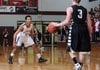 Jordan Dennis, left, a Springdale High guard, has some of his toughest battles at home against his older brother, Tony, who is also a guard for the Bulldogs.

