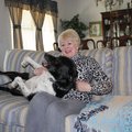 Joyce Pruett and Jake enjoy some play time at their Springdale home.
