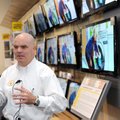 Jim Lemmon, sales manager for the Fayetteville Best Buy, explains the features of LCD and LED flat-s...