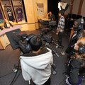 ‘BULLDOG PAUSE’  Madison Watkins, right, a senior at Fayetteville High School, watches Thursday whil...