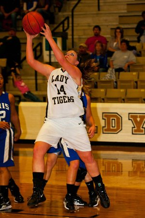 #14 Paityn McLaughlin of Charleston goes up for a basket during the first half.