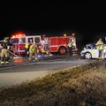 Fayetteville emergency personnel work to clean up debris Tuesday, Jan. 31, 2012, in the wake of a tw...