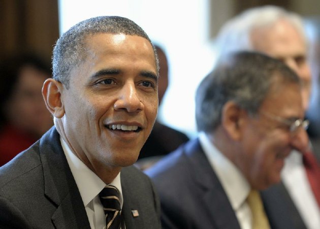 president-barack-obama-sitting-next-to-defense-secretary-leon-panetta-speaks-tuesday-during-a-cabinet-meeting-in-the-white-house-in-washington