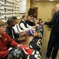 STAFF PHOTO J.S. WEDGEWORTH -- Bentonville football coach Barry Lunney talks to the eight players fr...