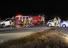 Fayetteville emergency personnel work to clean up debris Tuesday in the wake of a two-car collision on Interstate 540 north of Wedington Drive in Fayetteville.