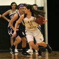 Abby Smith, Prairie Grove sophomore, drives to the basket Tuesday against Ozark during the first hal...