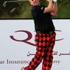Daly battles wind, sand to take spot near leader