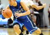 Duke’s Austin Rivers (0) steals the ball from Virginia Tech’s Erick Green during the first half of Thursday’s game in Blacksburg, Va. Rivers finished with 18 points. 
