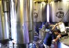 Arkansas Democrat-Gazette/BENJAMIN KRAIN --2/2/12--
Jesse Melton, a brewmaster at Diamond Bear, examines fermenting tanks while cooking a batch of some of the 6 different types of beers the Little Rock brewery makes. In March the brewery will start selling a new Strawberry Blonde seasonal beer. 