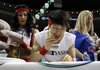 Japanese competitive eater Takeru Kobayashi eats chicken wings during SportsRadio WIP’s Wing Bowl 2012 eating contest Friday, Feb. 3, 2012 in Philadelphia. Kobayashi won by eating 337 wings. The annual event is held the Friday before the Super Bowl.