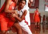 Little Rock Hall’s Yasmine Parks (left) and Jacksonville’s Sacha Richardson tie up a loose ball during Friday’s game in Jacksonville. The Lady Warriors won 73-48.