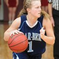 Springdale Har-Ber’s Samantha Weber drives down the court Friday during the second half of the game ...
