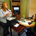Lacy Maybee, left, a child advocate and forensic interviewer, meets Friday with Shanna Robertson, a ...