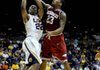 LSU's Ralston Turner,left, shoots against Arkansas' Julysses Nobles during an NCAA college basketball game, Saturday, Feb. 4, 2012 at Pete Maravich Assembly Center on the LSU campus in Baton Rouge, La.  (AP Photo/The Advocate, Libby Isenhower) MAGS OUT, INTERNET OUT, NO SALES, TV OUT, FOREIGN OUT, LOUISIANA BUSINESS INC./GREATER BATON ROUGE BUSINESS REPORT/225/10/12/IN REGISTER/LBI CUSTOM PUBLICATIONS OUT 