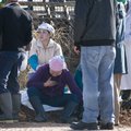A Cargill worker comforts another worker after an ammonia leak Monday.