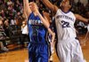 Sarah Grace Groves, Rogers High senior guard, left, attempts a shot in the lane as Fayetteville senior guard Jessica Boyd reaches to defend. Groves is this week’s 7A-West Conference Girls Player of the Week.