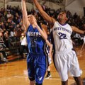 Sarah Grace Groves, Rogers High senior guard, left, attempts a shot in the lane as Fayetteville seni...