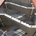 Heather Batson walks down the stairs of the parking garage at the Northwest Arkansas Community Colle...