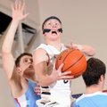 Bentonville’s Austin Haggard, center, takes the ball to the basket between Fort Smith Southside’s Sa...