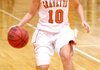 Gravette senior Shyanne Nichols brings the ball downcourt in play against Farmington on Jan. 27.