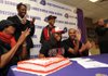 Sydney Conley, center, a Fayetteville standout, smiles Wednesday after signing a letter of intent to attend the University of Alabama on a track and field scholarship during a ceremony at Fayetteville High. With Conley are, from left, her mother, Regina, brothers Jordan and Jon; and her father, Mike.