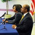 Michelle Obama (left) attends a briefing with Little Rock Air Force Base officials about the success...