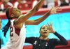 Arkansas Democrat-Gazette/MICHAEL WOODS --02/09/2012-- University of Arkansas' Ashley Daniels tries to drive past South Carolina defender Charenee Stephens  in the first half of Thursday nights game at Bud Walton Arena in Fayetteville.