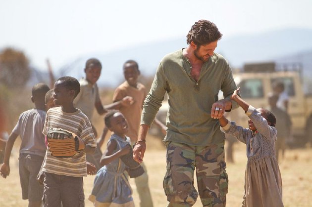 sam-childers-gerard-butler-is-willing-to-fight-to-protect-african-children-from-a-vicious-warlord-in-the-based-on-a-true-story-machine-gun-preacher