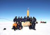 In this Monday, Feb. 5, 2012 photo provided by the Arctic and Antarctic Research Institute of St. Petersburg, Russian researchers at the Vostok station in Antarctica pose for a picture after reaching the subglacial lake Vostok. Scientists hold the sign reading "05.02.12, Vostok station, boreshaft 5gr, lake at depth 3769.3 metres." The Russian team reached the lake hidden under miles of Antarctic ice on Sunday, a major scientific discovery that could provide clues for search for life on other planets. 