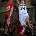McKinzie James, Rogers High, makes a jump shot Jan. 17 over Fort Smith Northside’s Courtney Flemming...