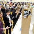 SCIENCE FAIR Sheilah Roenfeldt, second from left, Fayetteville Public Schools’ Science and Engineeri...