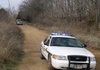 A Washington County Sheriff’s Office patrol car blocks a portion of Smokey Lane near Greenland on Thursday as emergency personnel were called about a man barricading himself in his home.
