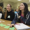 Kim Sweaza, from left, and Kimber Randolph, Walmart associates, listen to instruction Thursday with ...