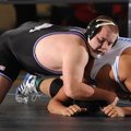 Fayetteville’s Austin Hubble, left, and Rogers’ Juan Balderas compete in the championship bout for t...
