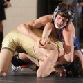Dylan Collins, right, of Springdale Har-Ber and Bentonville’s Tony Ellis compete in the championship...