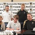 Trenton Hill, a Bentonville senior, signs to play baseball for Maple Woods Community College in Kans...