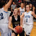 Tayler Lee, Bentonville Lady Tiger, looks to go up for a shot against Har-Ber Lady Wildcat’s Tayleah...